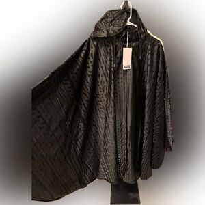 RAINS Monogram Print Hooded Cape- Color: Black Monogram. Size: L. NWT *RARE*